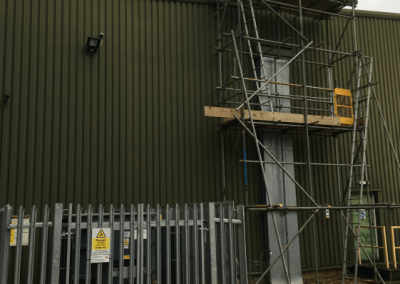 Access tower with roof edge protection handrail, RPC Containers, Oakham
